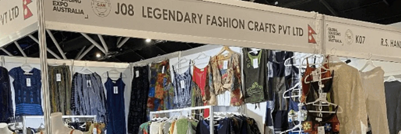 The Legendary Fashion Crafts stall at a trade fair in Australia, hung with its clothing