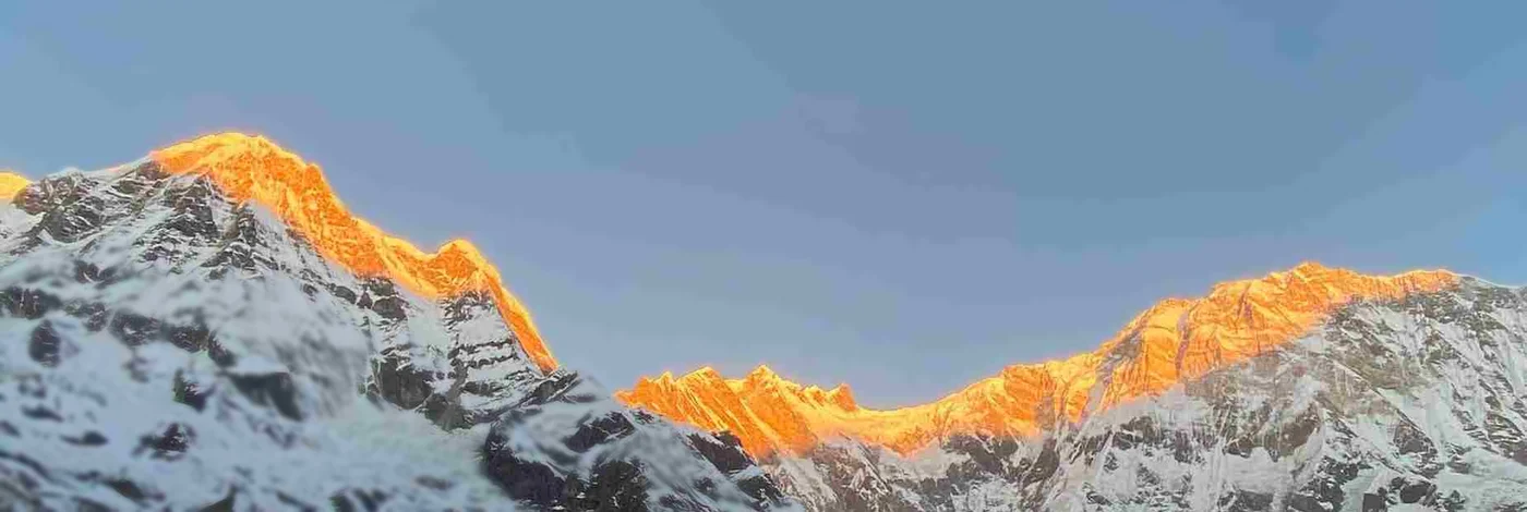 Sunrise on the Annapurna range from base camp, a photograph from the company's own trip page